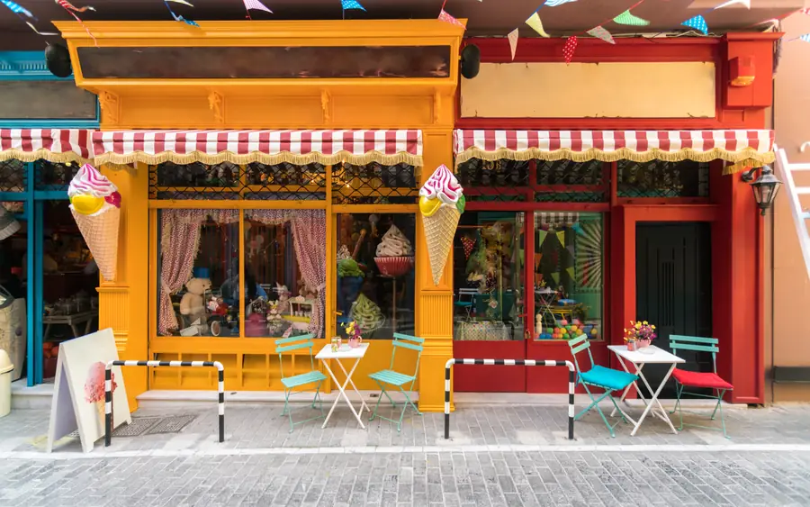 A café shopfront with tables outside
